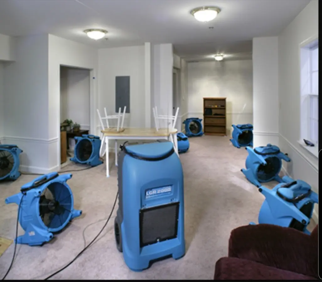 Air movers and dehumidifier setup for Water Damage Restoration in Todd Creek